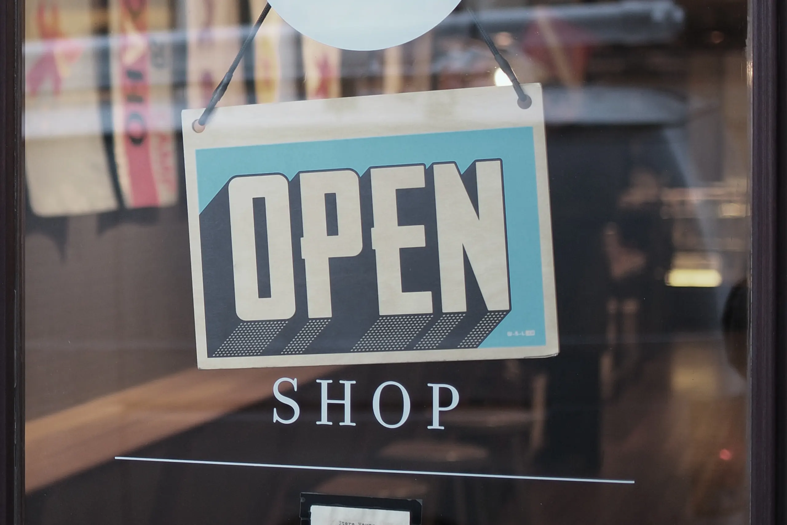 Open sign in shop window