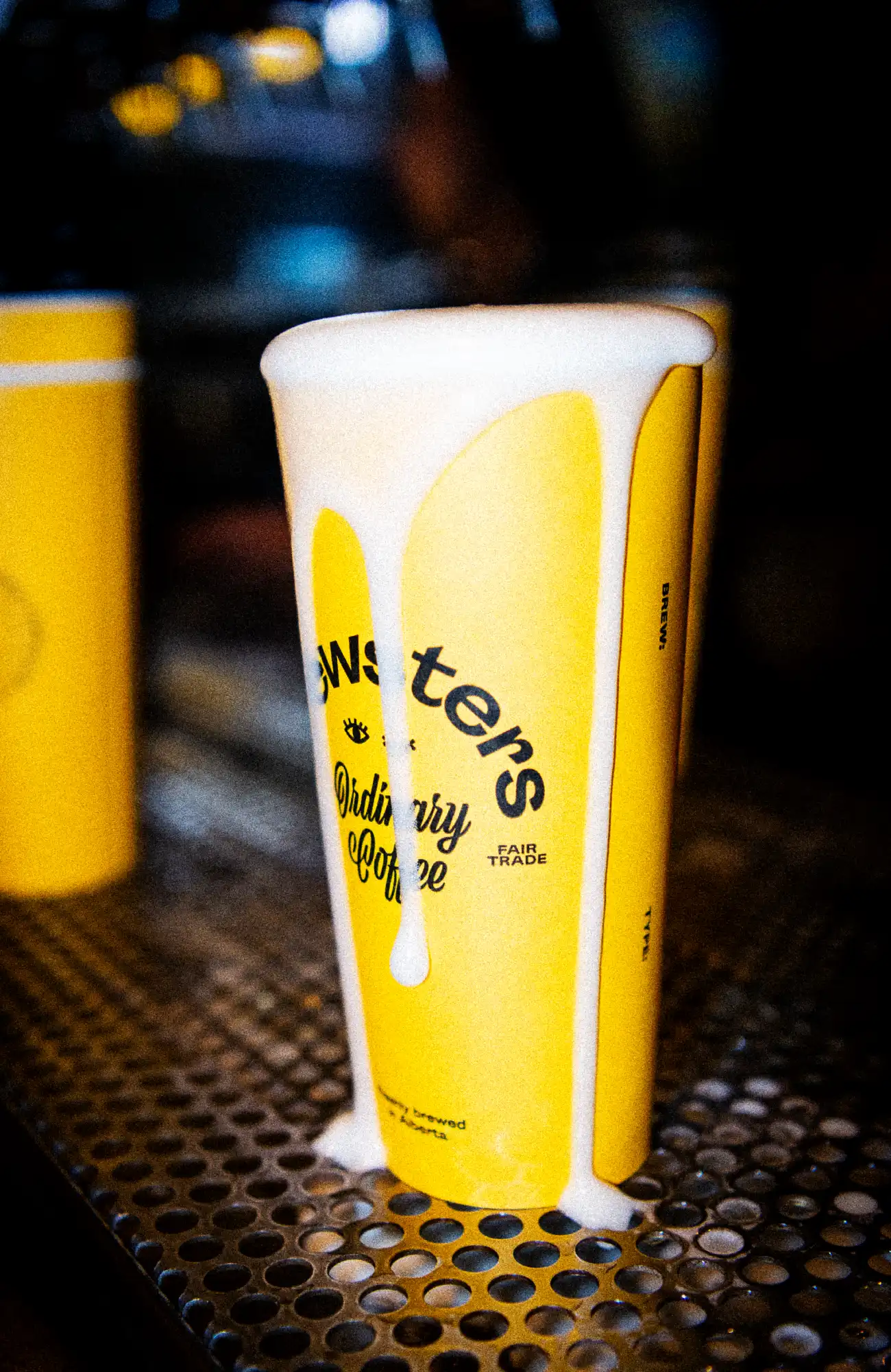 Beer foam overflowing Brewsters cup