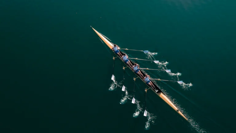 team of rowers in a boat